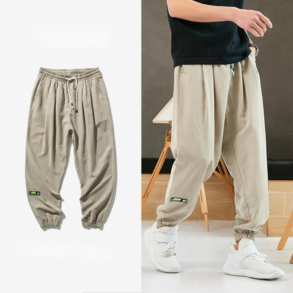 Pantaloni larghi leggeri jogger con coulisse alla caviglia da uomo aspie shop neurodivergenti neurodivergenza ADHD autism dyspraxia dyslexia spectrum neurodiversity neurodiverse conditions Tourette down dyscalculia Irlen autisme dyspraxie spectre dyslexie neurodiversité affections dyscalculie neurodivergents syndrome Asperger moda donna uomo bambino abbigliamento accessori mode femmes hommes enfants vêtements accessoires fashion women men children clothing accessories