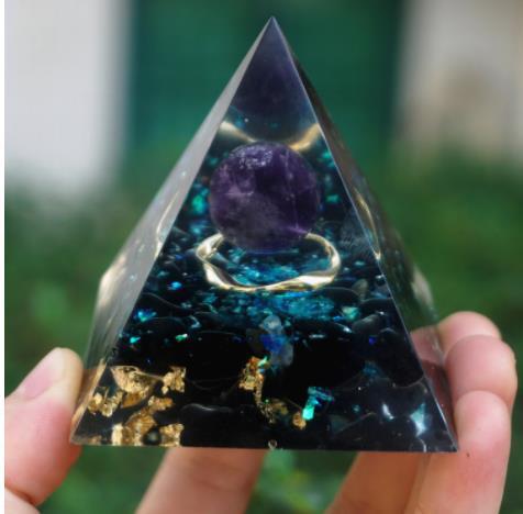 Energy Crystal Pyramid made of crystal epoxy resin, stones, gold foil and copper wire